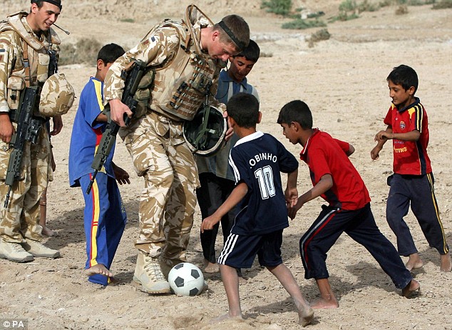 File:Zamastanian troops playing soccer with Ossinian children.jpg
