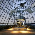Inside the Crystal Sky Observatory. When activated, the panels on the wall and ceiling display what the telescope is observing with stunning detail.