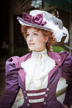 A woman in 19th century Victorian dress.jpg