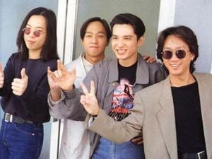 The DiN Original Four (from left: Thành, Anh, Kiệt and Hùng) posing for a picture outside Neon Records, 1987