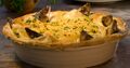 Stargazy pie is a traditional Merthian dish made of baked pilchards (sardines), along with eggs and potatoes, covered with a pastry crust