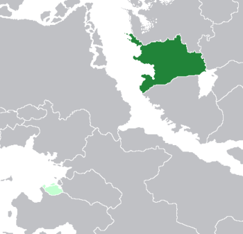 Location of Haguenau (dark green) and Étlaurlande (light green) in Astyria (grey)